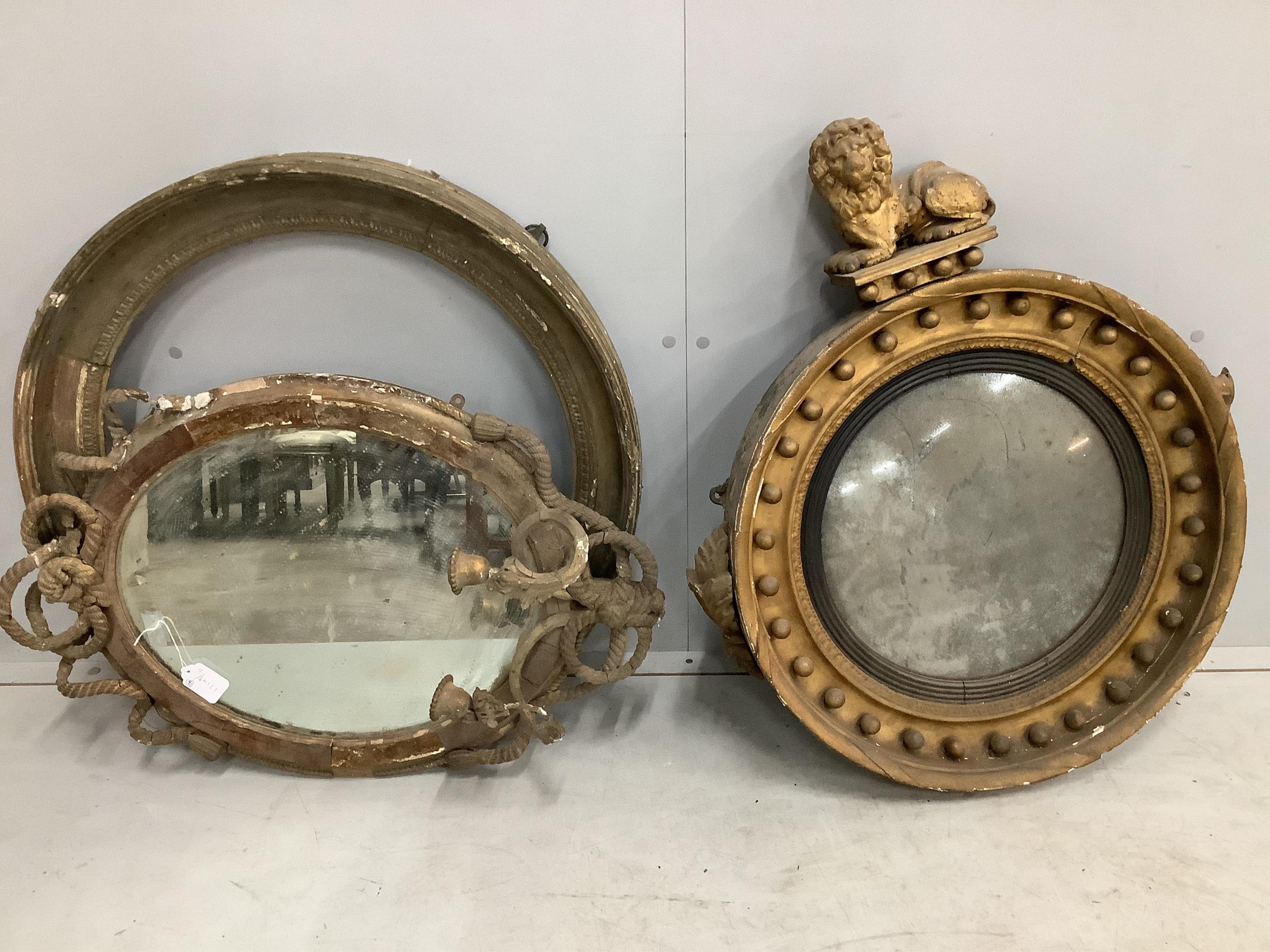 A Regency circular giltwood convex wall mirror with lion pediment, diameter 65cm a Regency convex mirror frame and Victorian girandole. Condition - poor